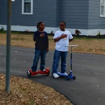 Two Young Boys Stop And Recites Pledge Of Allegiance As Flag Was Being Raised Outside Fire Department